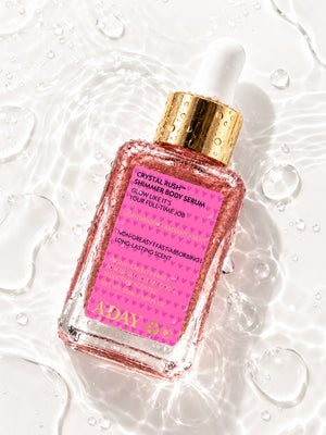 ADAY Crystal Rush Shimmer Body Serum lying in shallow water, seen from above