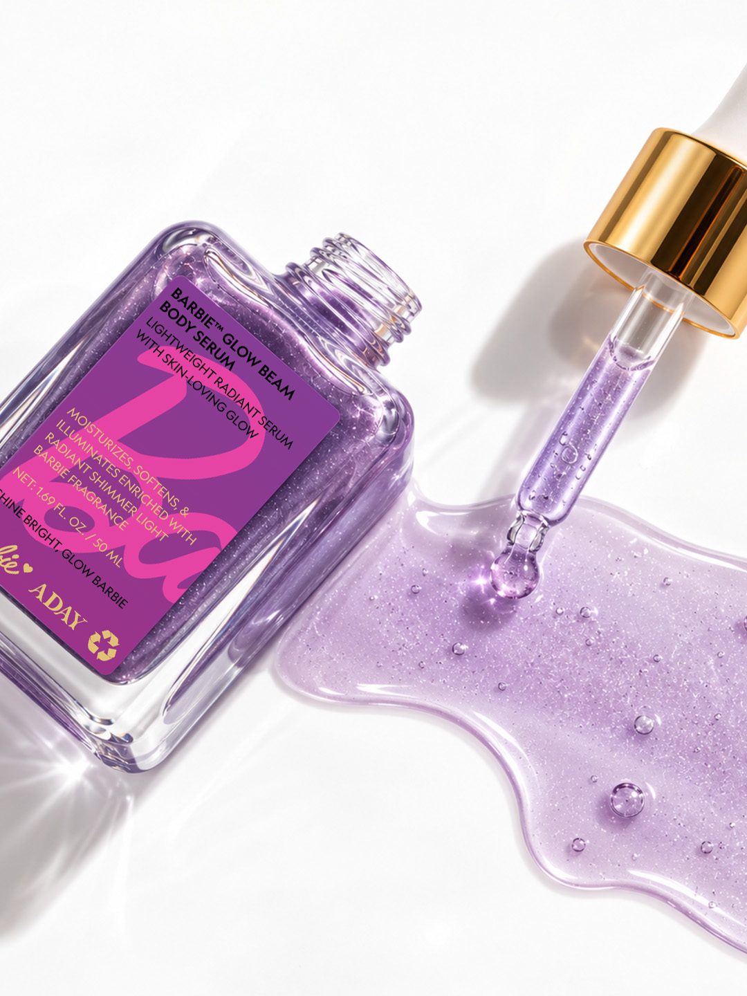 The dropper and a swatch of lilac shimmer serum