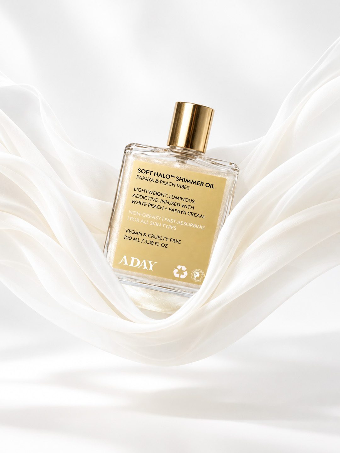 Soft Halo Shimmer Oil in a swirl of cream